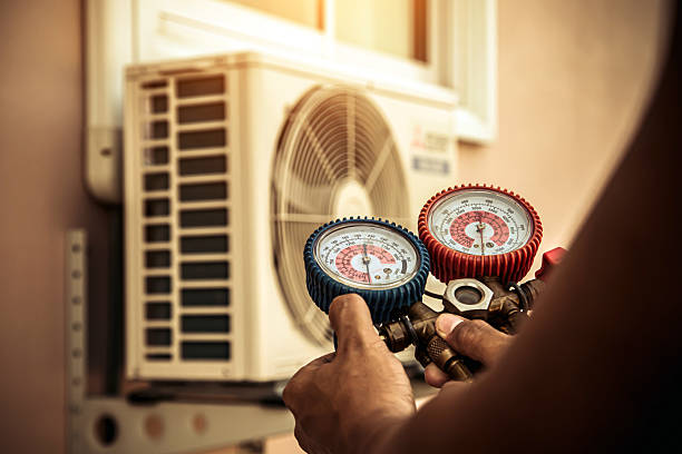 Professional Ductwork Repair technician working in Belmont, MA